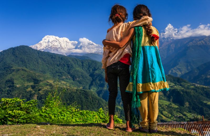 Two girls standing together